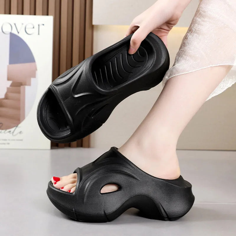 Women's thick-soled EVA slippers in white, black, or rose red colours with rounded toe design