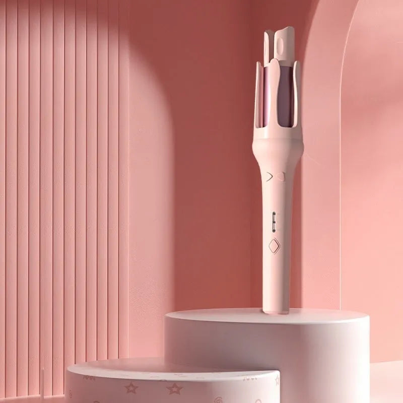 White and pink automatic hair curler with a rotating 32mm ceramic barrel and a power plug.