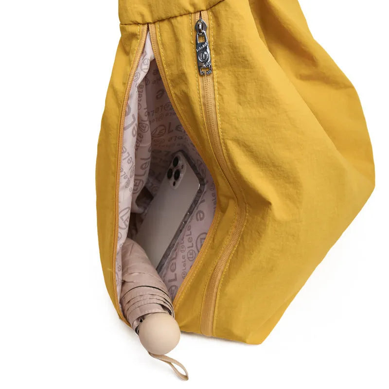 Soft nylon women's underarm bag in heart shape design showing large capacity