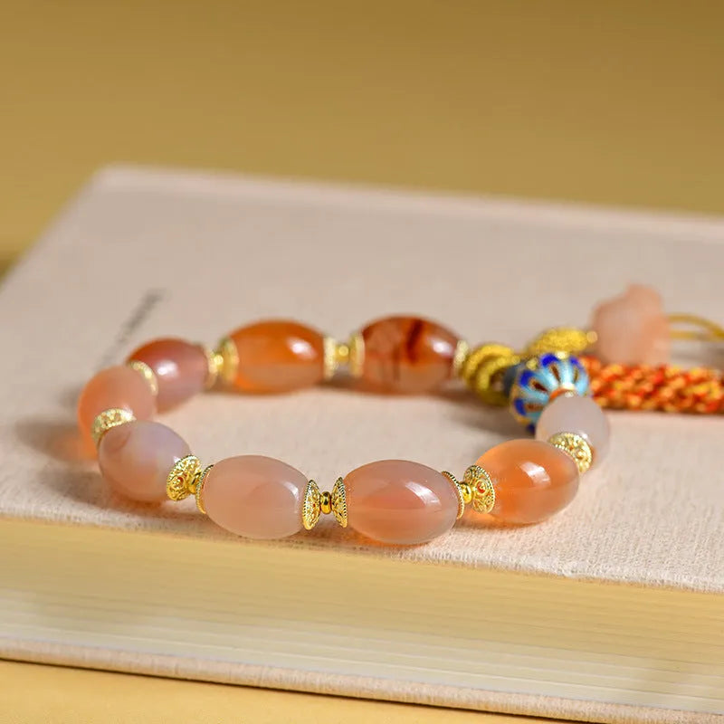 Handcrafted agate Tibetan bracelet with flower and geometric designs in vintage ethnic style