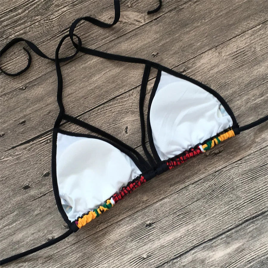 Women's high-waist bikini swimsuit with digital printing, showing top and quick-dry shorts.