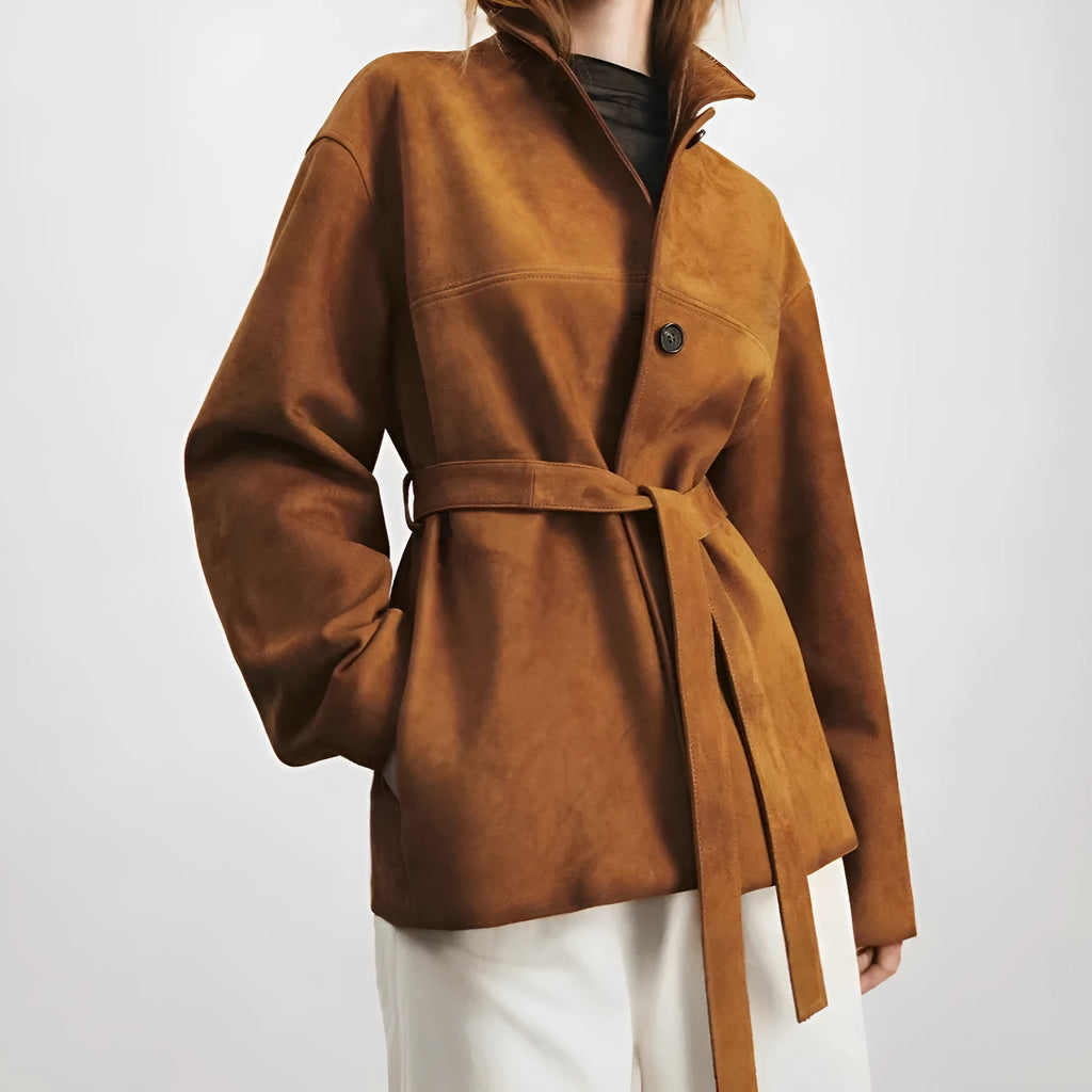 Yellow Brown loose-fit cashmere coat with Peter Pan collar and leather stitching details on front.