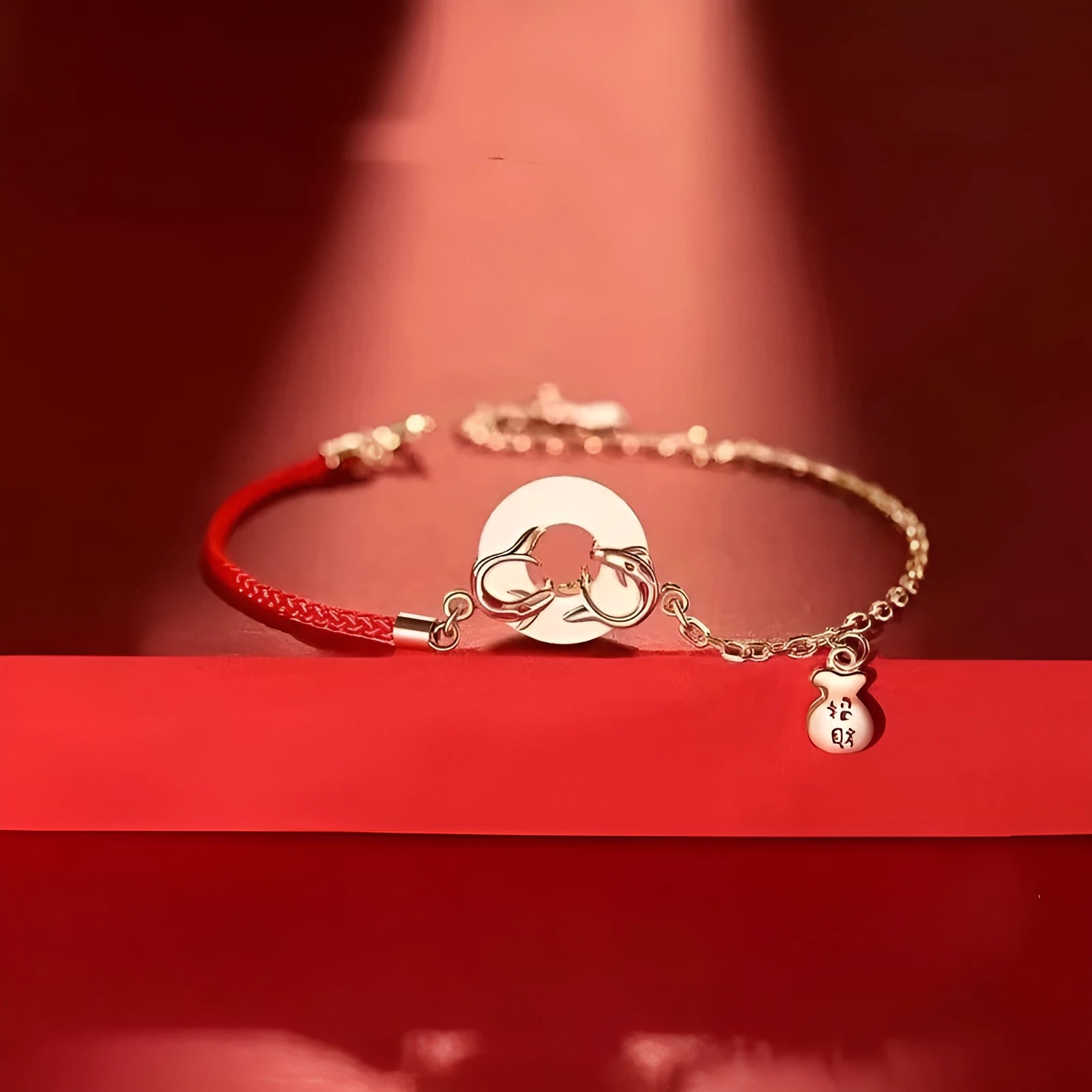 Women's festive koi bracelet with mixed materials, fishtail elements, and peace buckle closure