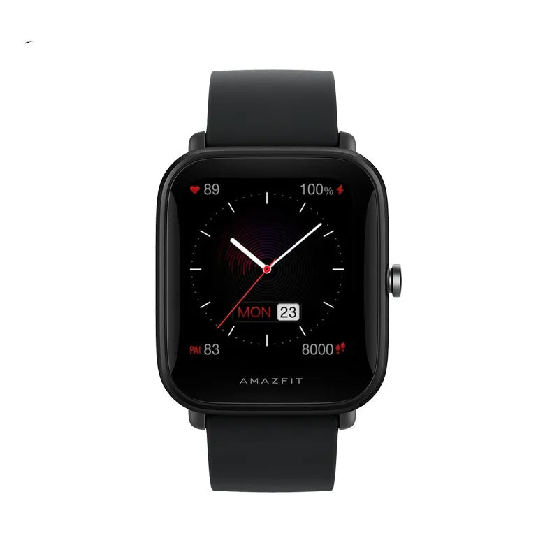 Smart watch with colour screen and green silicone strap on wrist, showing fitness data.