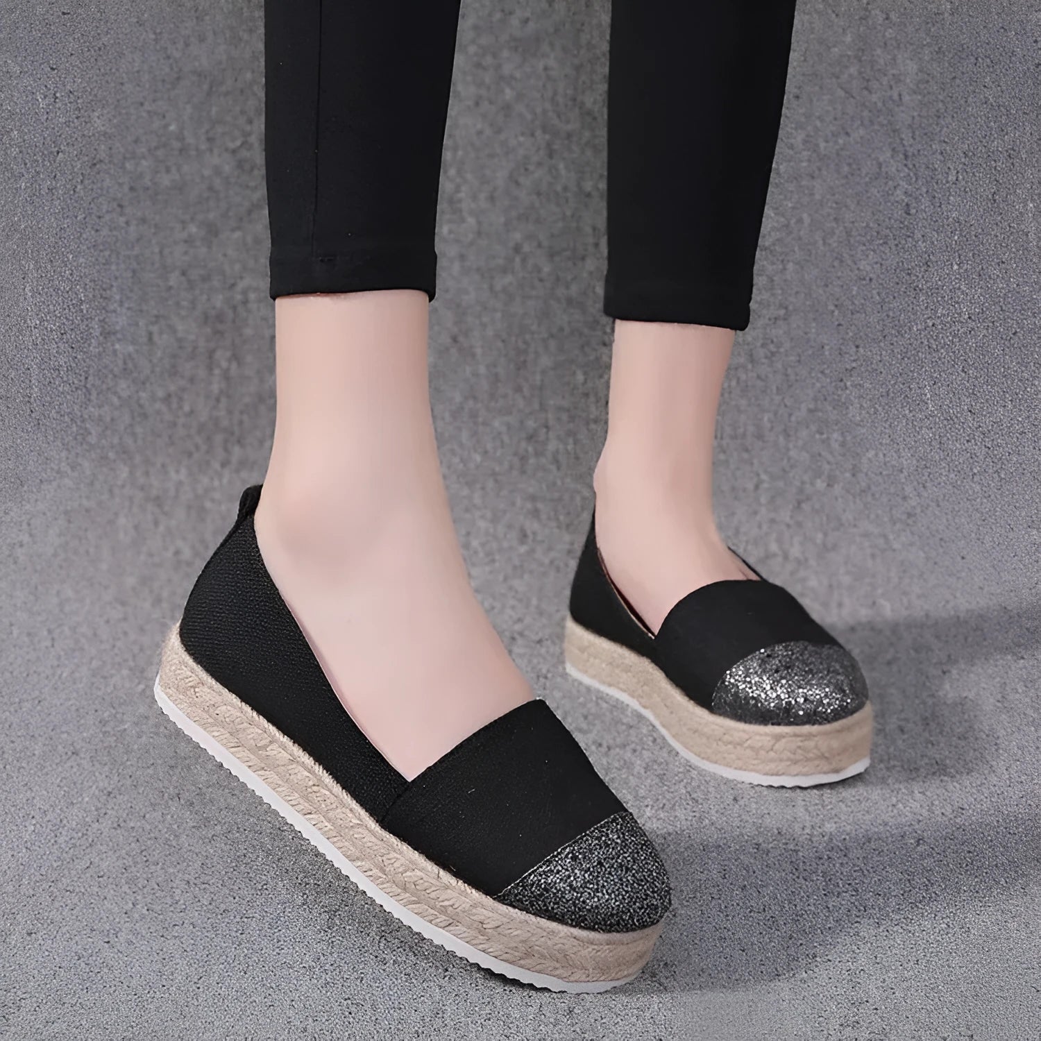 Plus size breathable canvas flat shoes in black and beige with round toe and slip-on design.