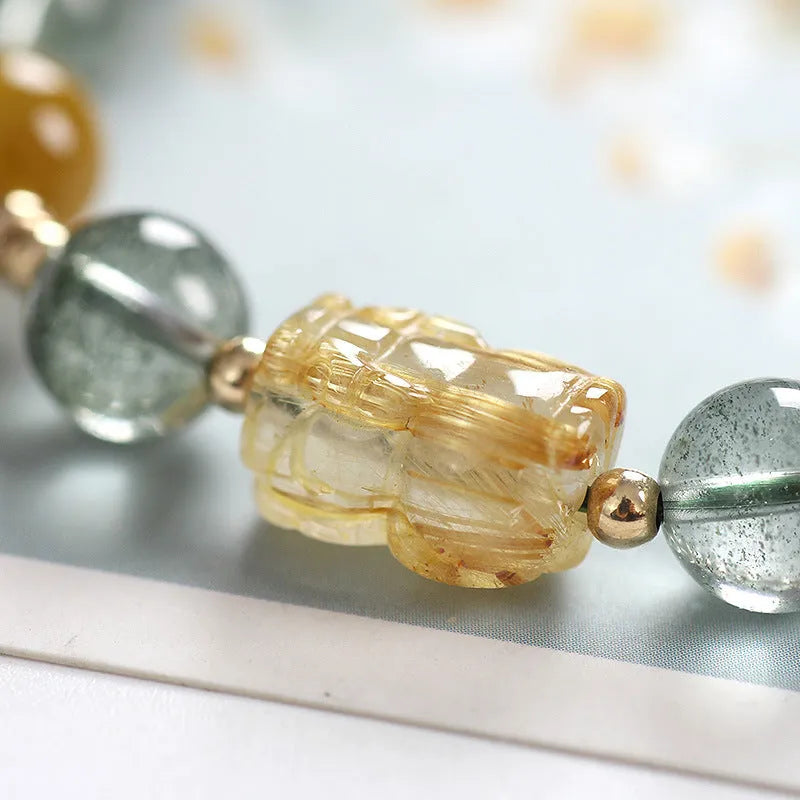 Green phantom quartz crystal bracelet with 8mm beads and gold rutilated quartz inclusions