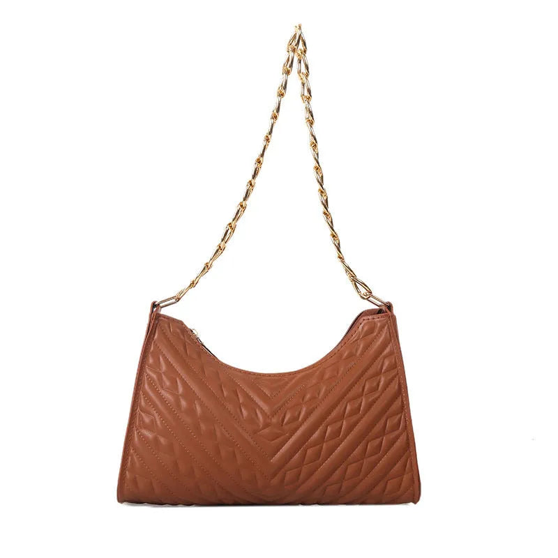 Brown pleated PU baguette shoulder bag with a top handle and long chain strap on a white background.