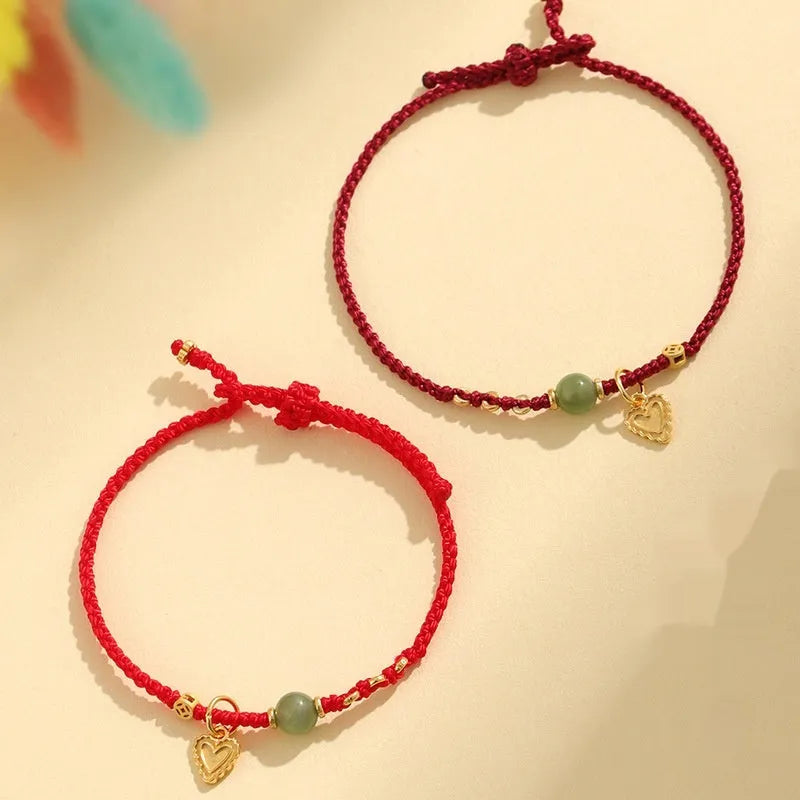Handmade woven women's bracelet with 925 silver and red Hetian jade beads on adjustable carrying strap