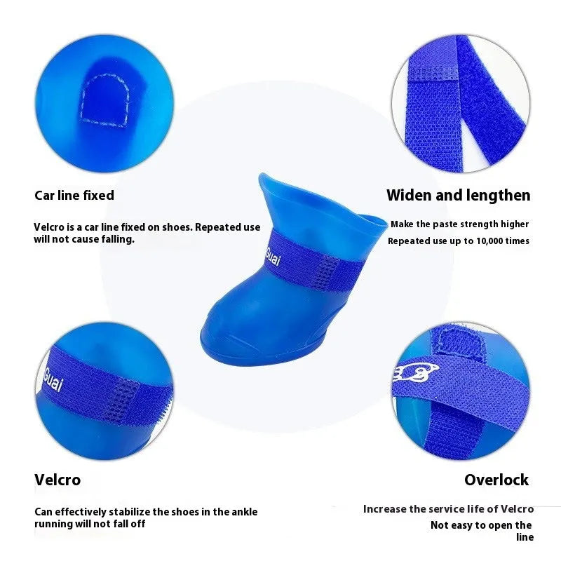 Set of four soft-soled rubber rain shoes for dogs in various colours on a wet surface.