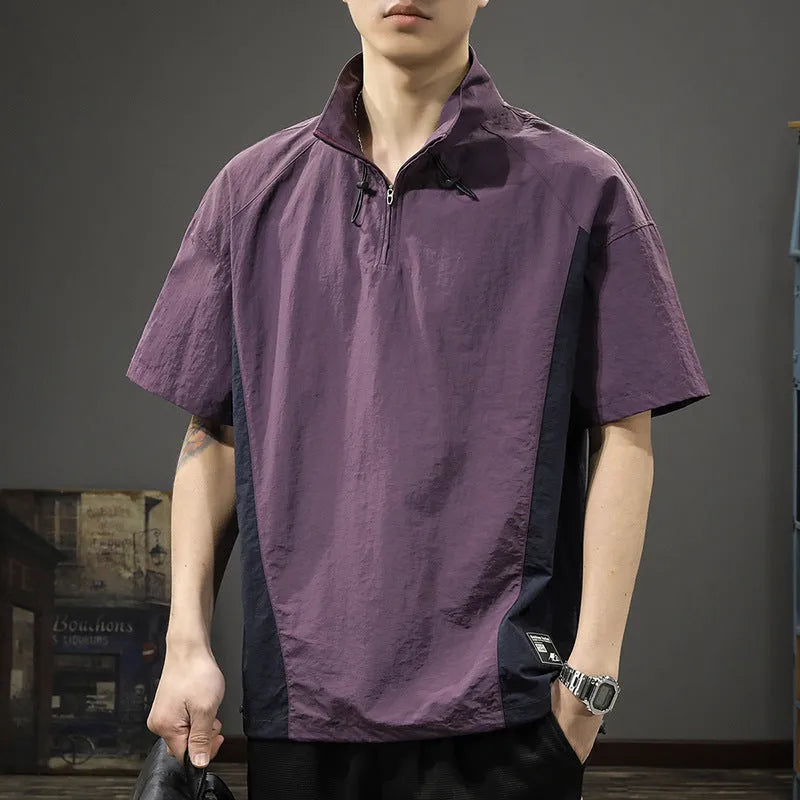 Brown men's half-zip stand collar casual shirt with short sleeves on a hanger.