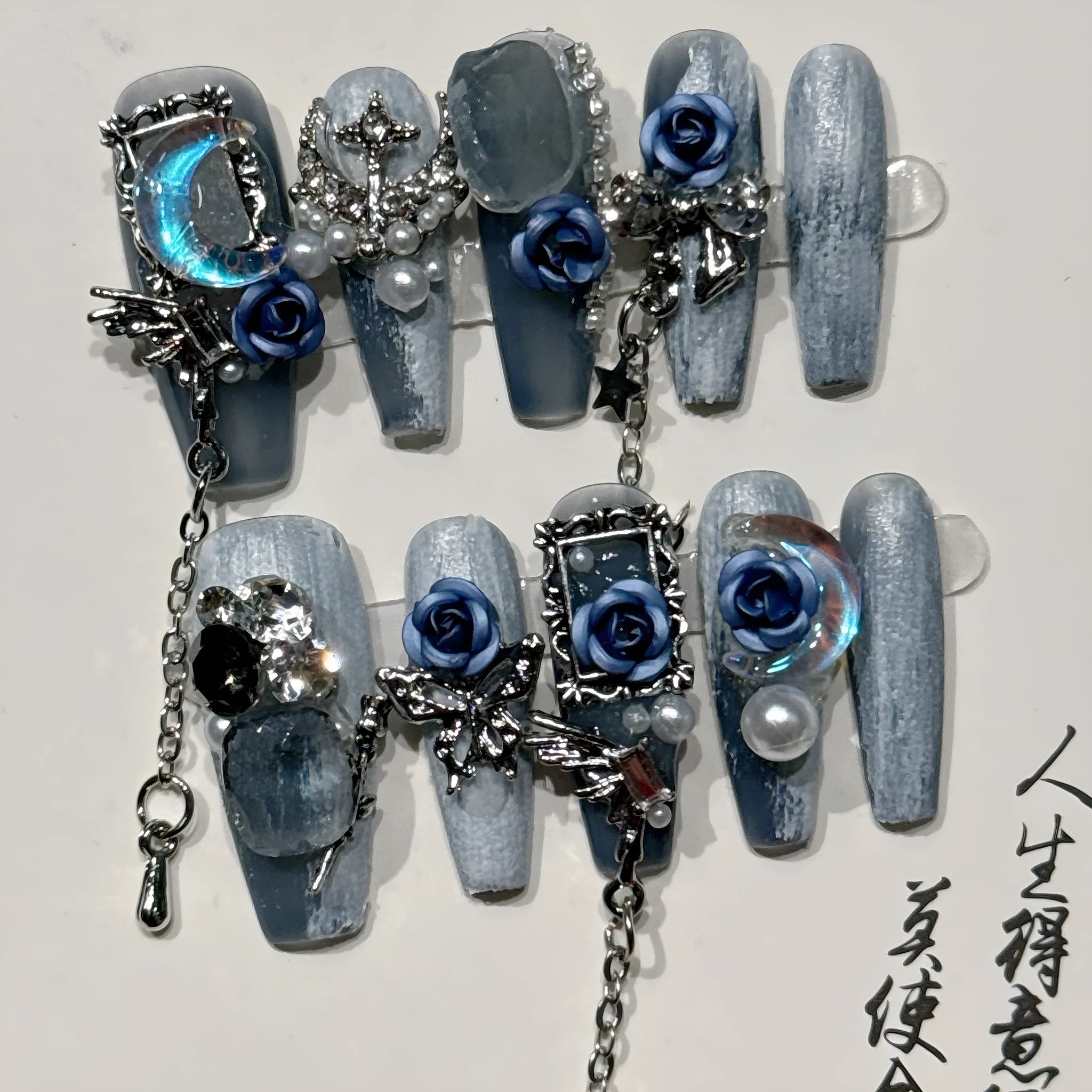 Heavy industry blue false nails with ornate rose and tulip floral pattern design in sizes XS S M L