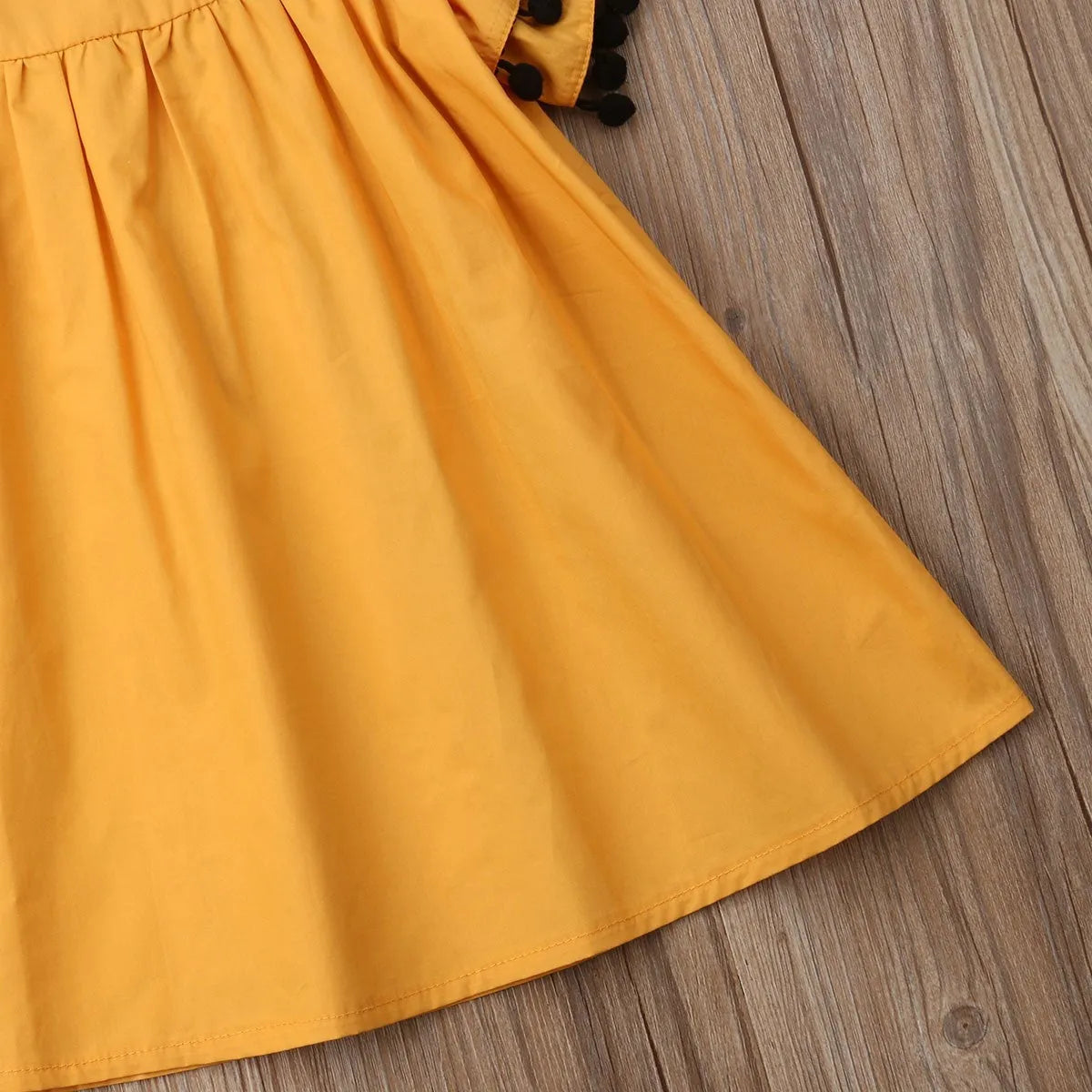 Orange sleeveless summer dress for girls available in sizes 12M through 5T