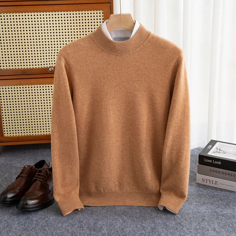 A man wearing a half-collar loose-fit wool sweater in a light business style, shown in a neutral colour.