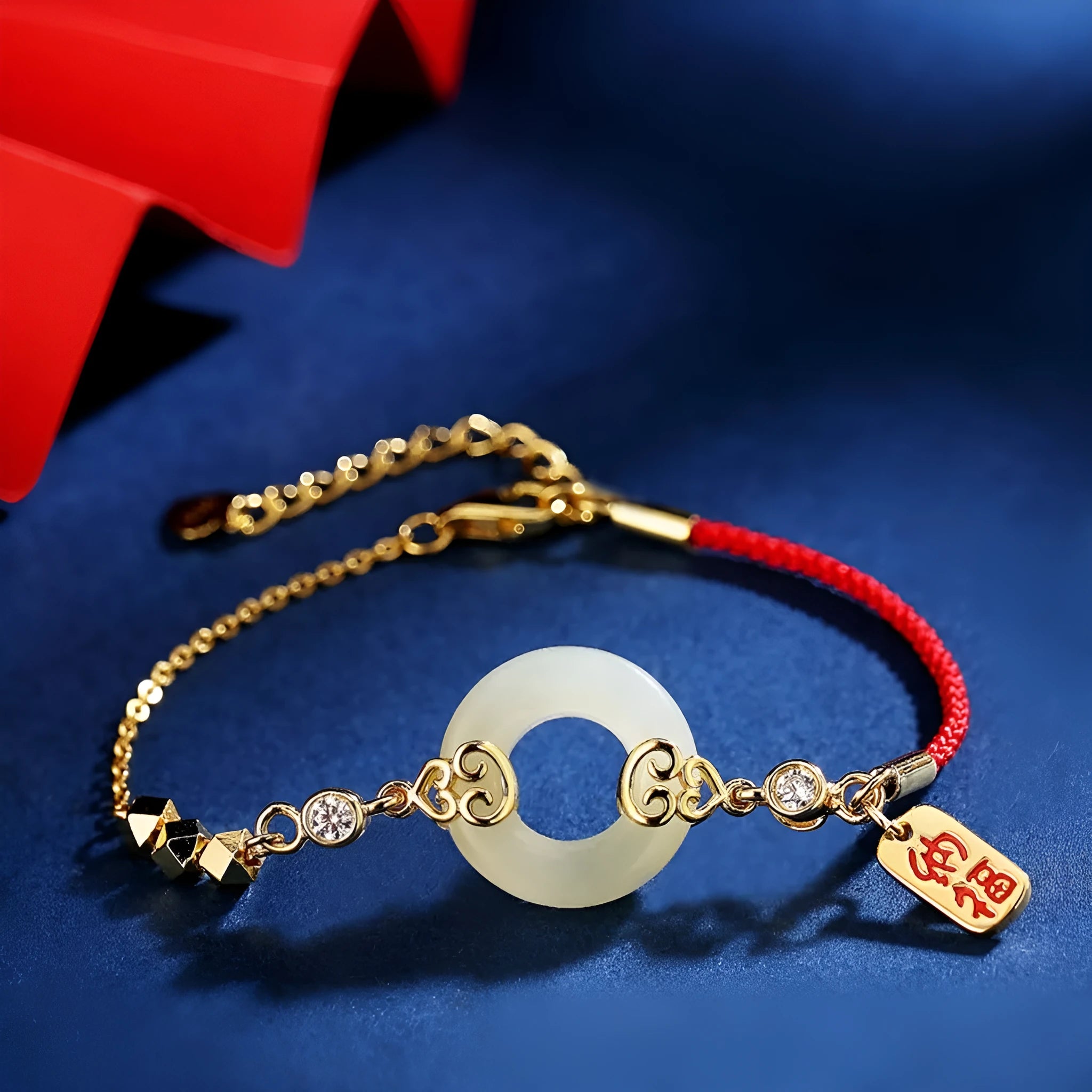 Women's Chinese style Hetian jade and sterling silver jewellery set showing bracelet, necklace, and earrings.