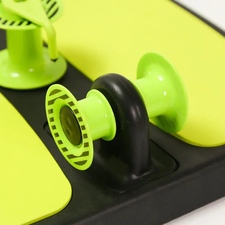Green multifunctional fitness machine arm stretcher in colour box with dimensions 40.5x41x11.5cm
