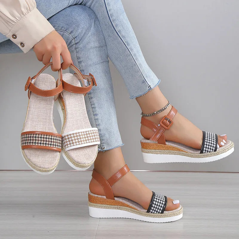 Women's houndstooth print buckle sandals in black with fish mouth toe on light background