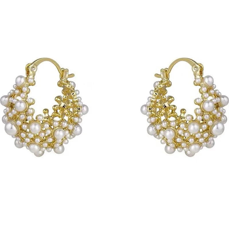 Gold women's earrings with flower basket design and small rice-shaped beads