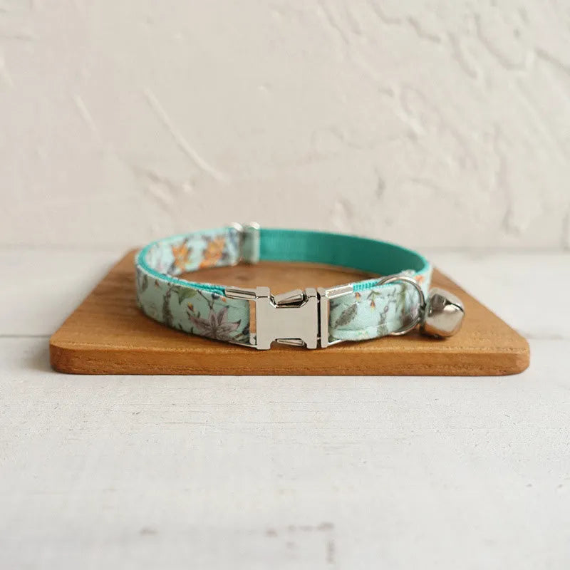 Adjustable green cloth webbing pet collar with buckle closure for dogs and cats