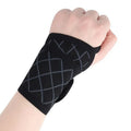 Adjustable wrist brace for carpal tunnel support, black unisex design with hook-and-loop strap