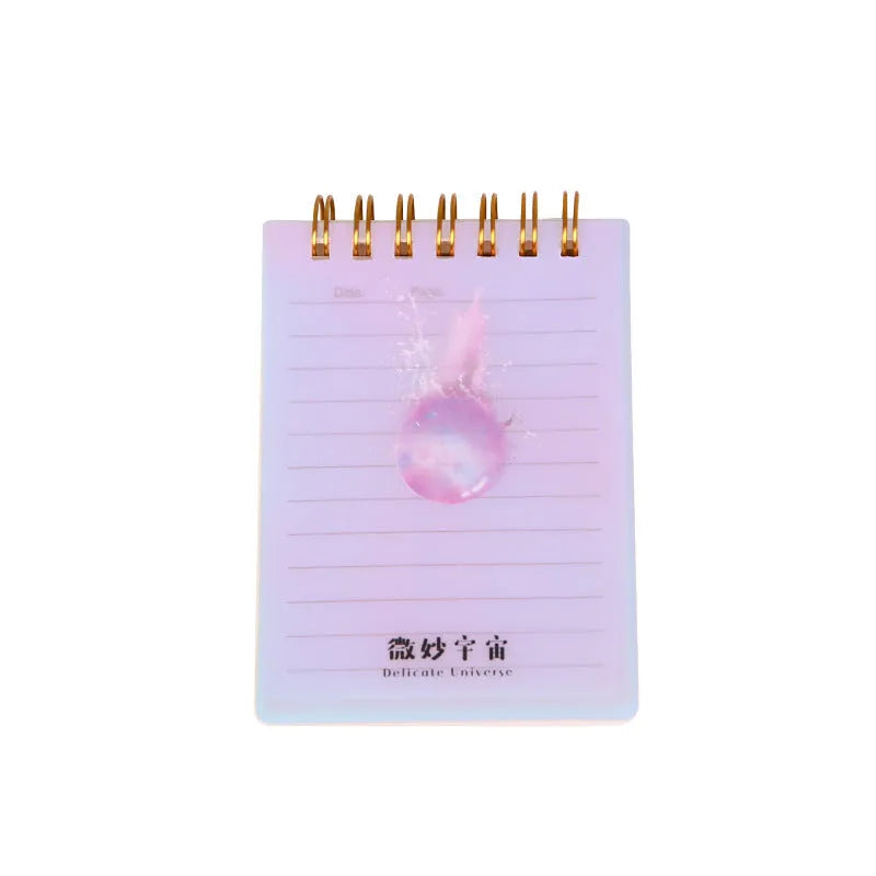A7 spiral-bound pocket notepad with PP cover in one of four colour series: Cherry Blossom, Constellation, Ocean, or Universe.