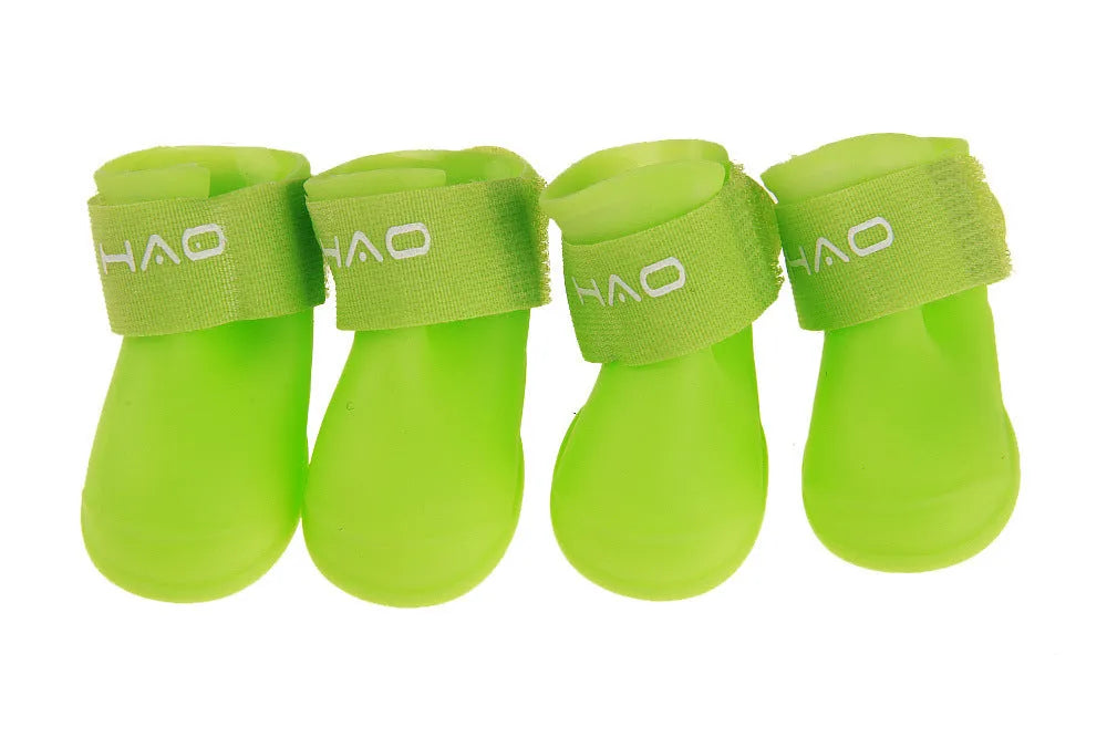 Candy pet rain boots in resin PVC, waterproof non-slip dog shoes, cartoon style, seven colours, sizes S to XXL
