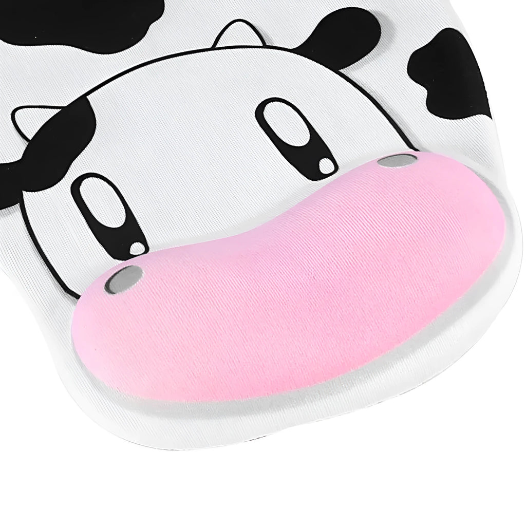 Cow silicone wrist mouse pad with soft hand rest and non-slip base on a desk