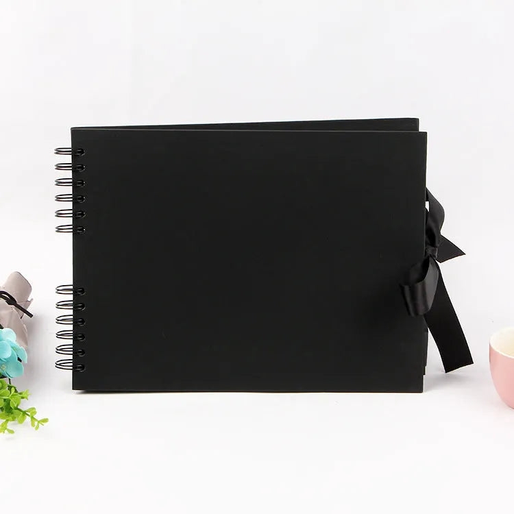 DIY handmade photo album with coil binding in yellow or black, showing its 290mm by 215mm size.