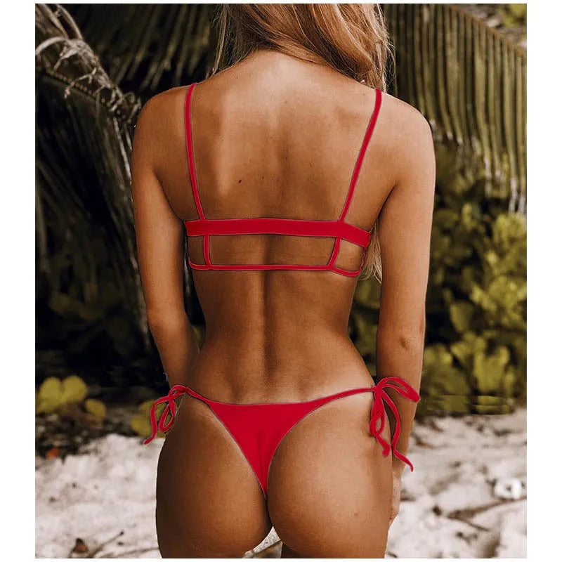 Ladies two-piece bikini swimwear set in polyester and spandex, available in black or red, sizes S M L