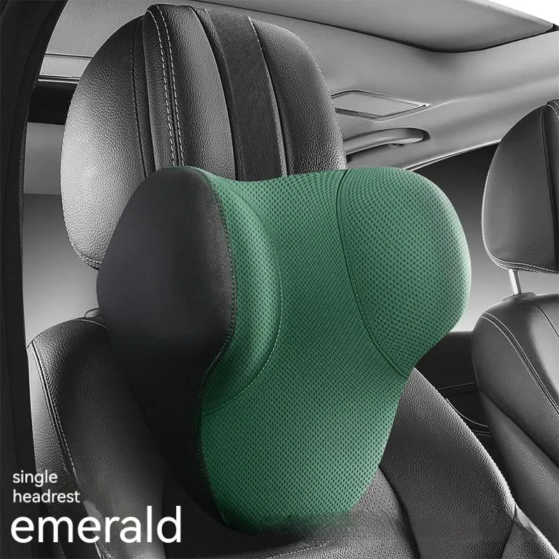 Black memory foam car headrest and lumbar support pillow set on a car seat