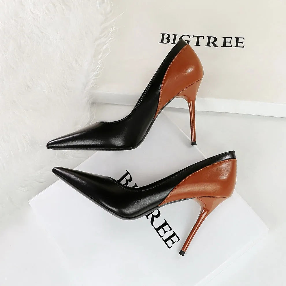 Women's retro style stiletto heel pumps in black with pointed toe and super high heel for banquet occasions