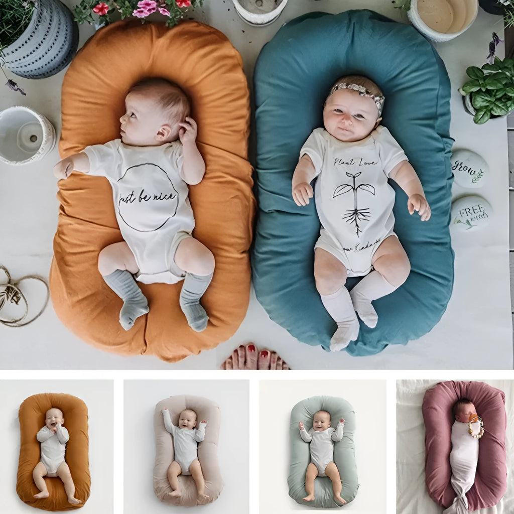 Portable baby nest crib in beige cotton measuring 45x75cm for infants