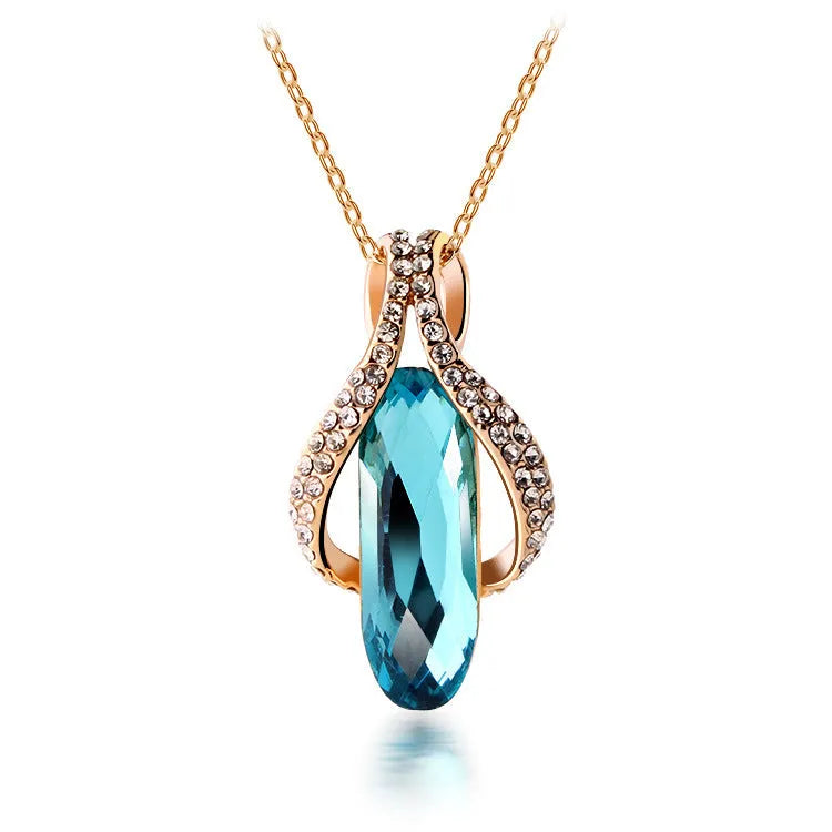 Gold-plated peacock blue earrings and pendant set for women, alloy jewellery with electroplated finish