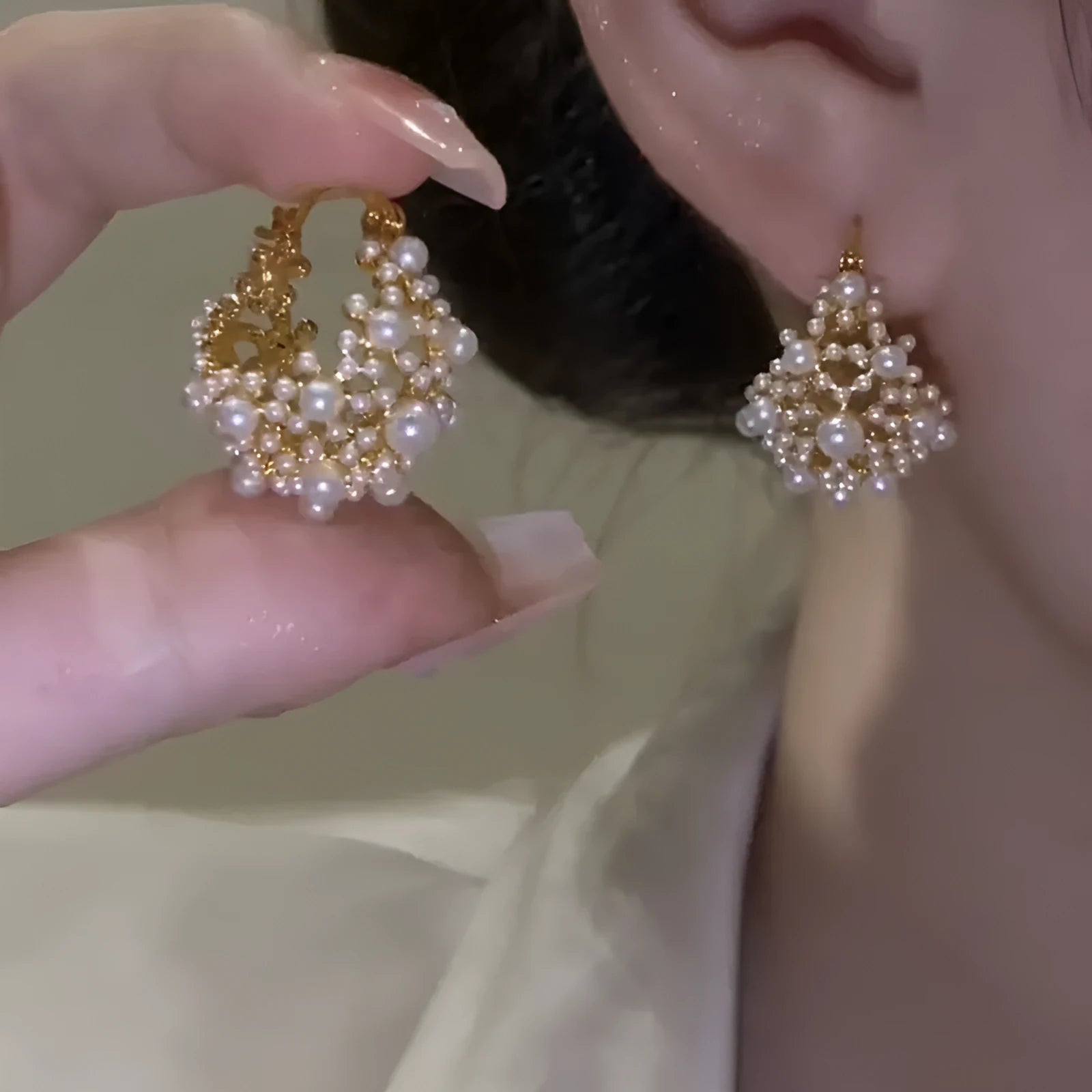 Gold women's earrings with flower basket design and small rice-shaped beads
