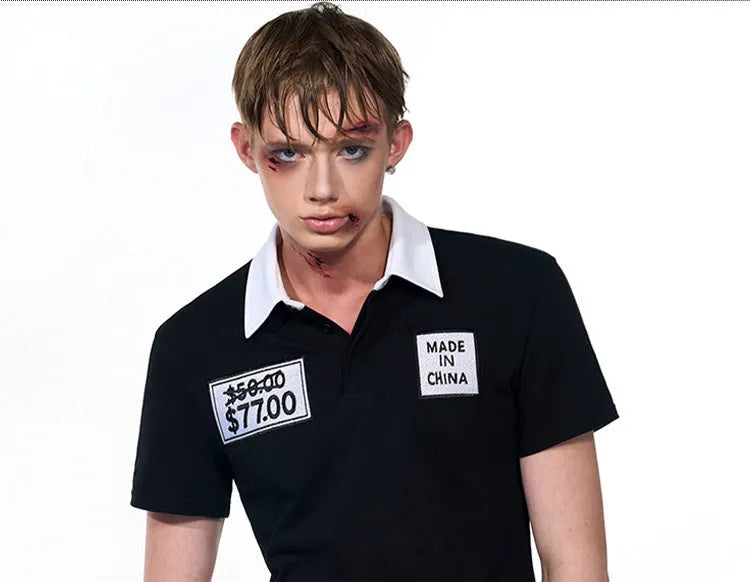 Black slim fit men's short sleeve polo shirt with embroidery detail on front