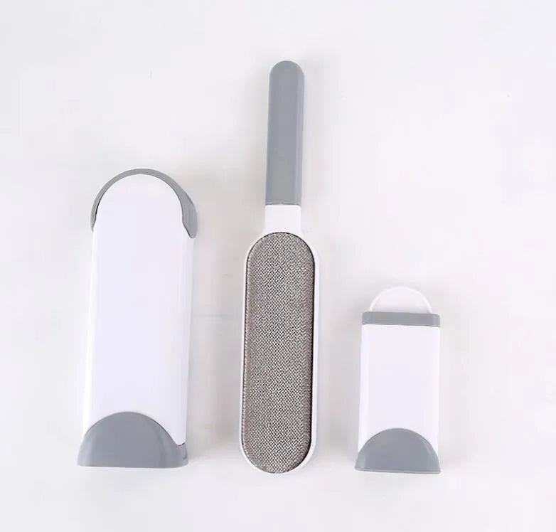Blue reusable pet hair removal brush with self-cleaning base for furniture and upholstery.