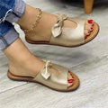 Ladies fish mouth sandals with a bow detail on the upper, shown in black, gold, and pink colour options.