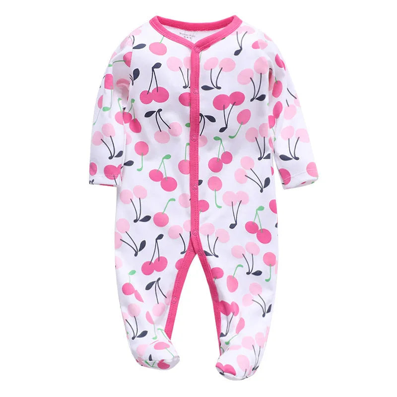 Cotton one-piece baby clothes showing dinosaur print and size options