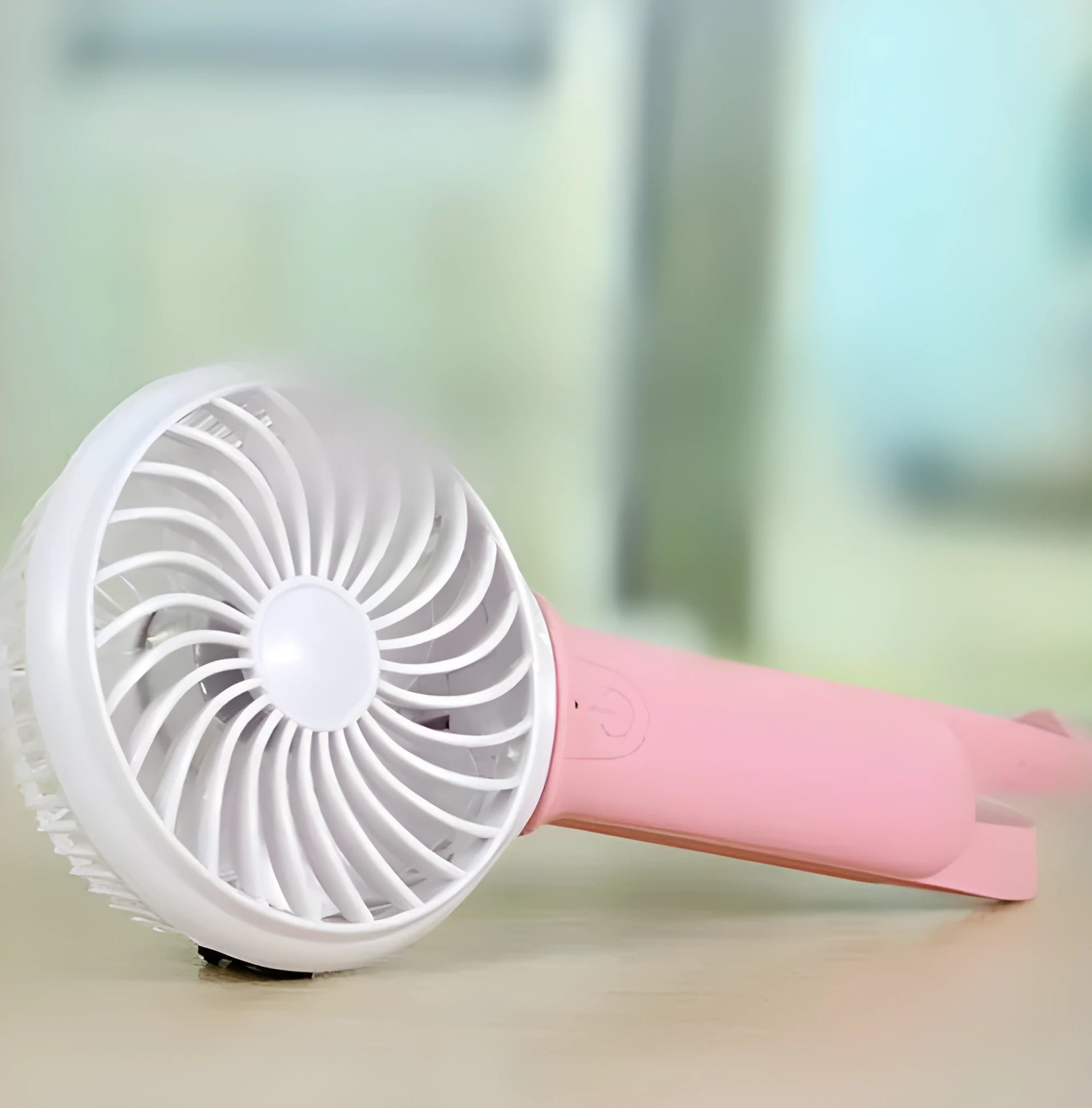 Handheld USB fan with LED light showing 200mm blades and adjustable speed control
