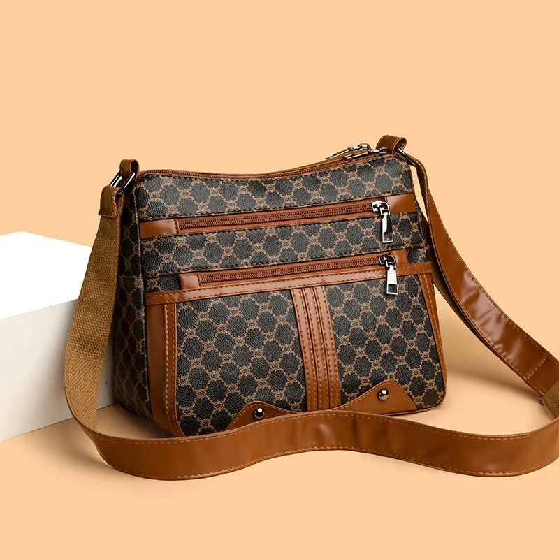 Women's brown and white stitching pattern large-capacity crossbody bag with PU exterior.