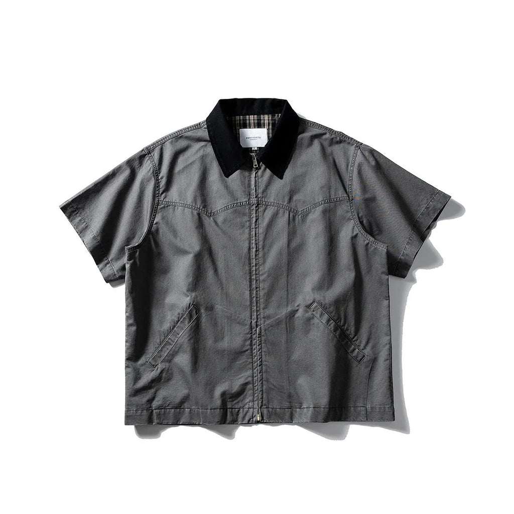 Short sleeve loose cotton overalls shirt in khaki colour on a hanger
