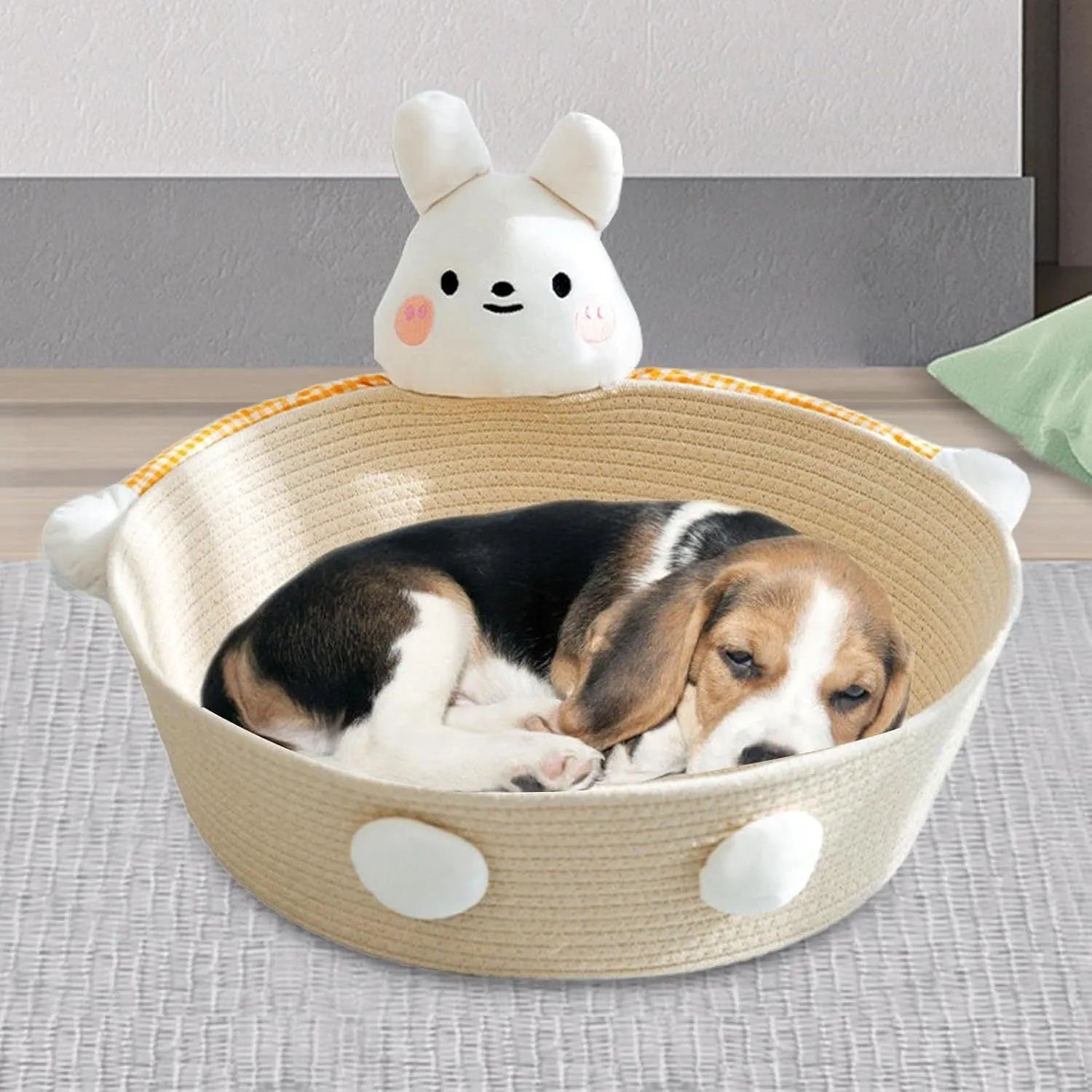 Woven cotton rope cat bed with scratching surface, shown with bear decoration in medium size.