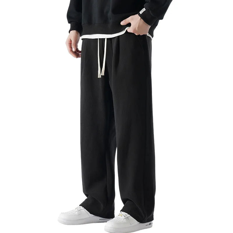 Men's apricot coloured double-sided polar fleece casual trousers with a loose fit and drawstring waist.