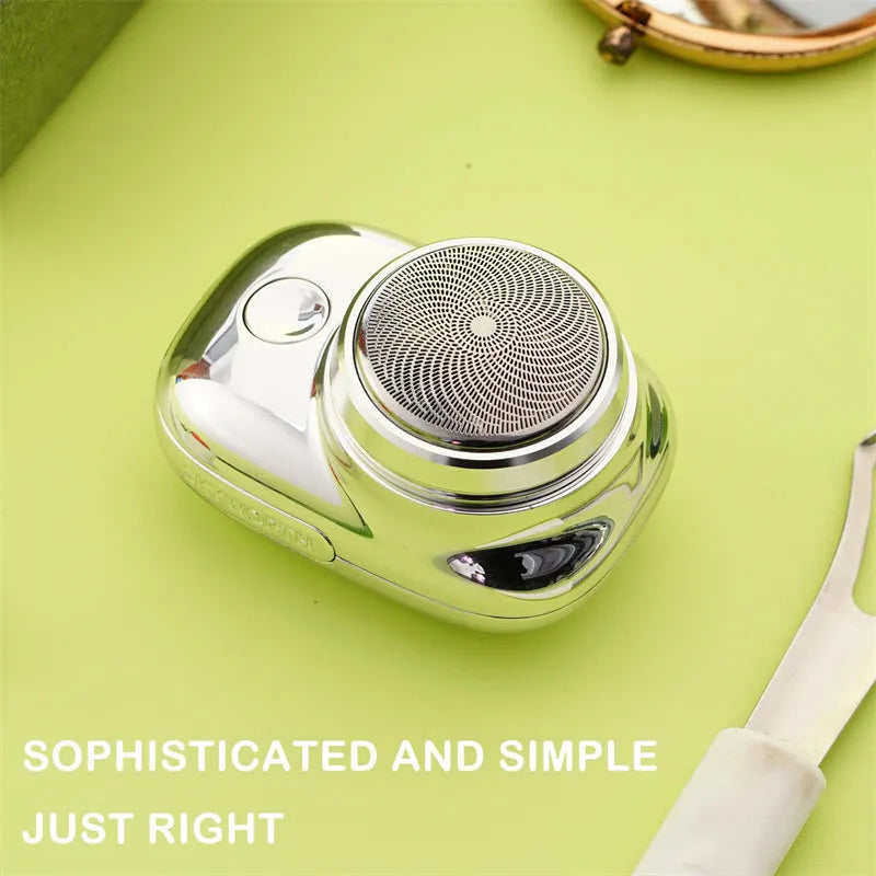 Mini portable USB rechargeable electric shaver with rotary 1-blade head, aluminium body, silver colour, wet and dry use