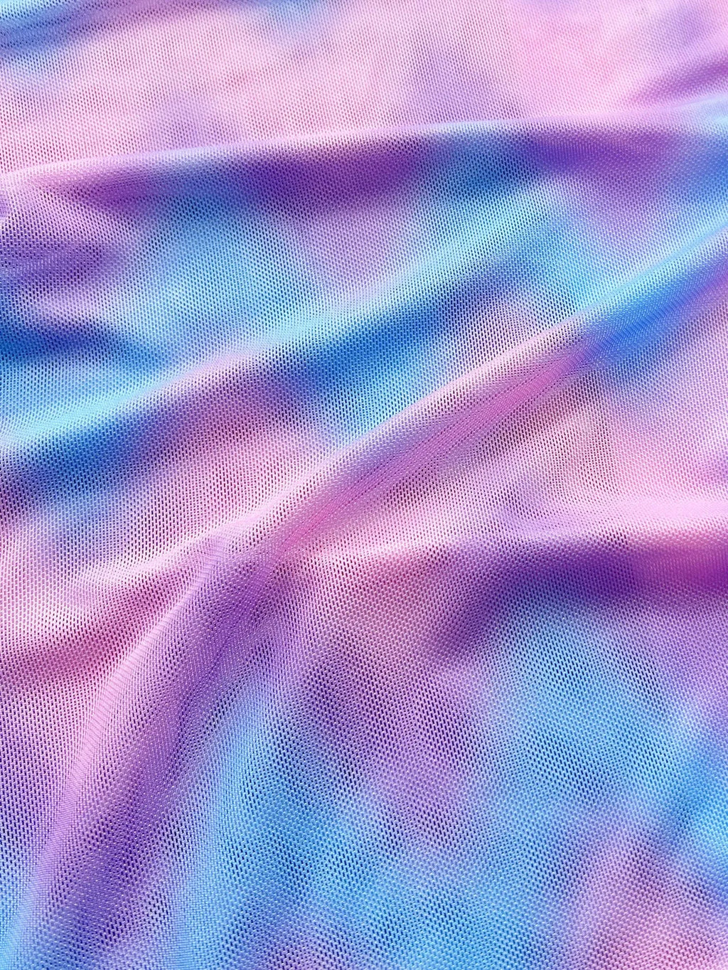 Women's tie-dye bikini swimsuit with split-front design and matching bra and briefs
