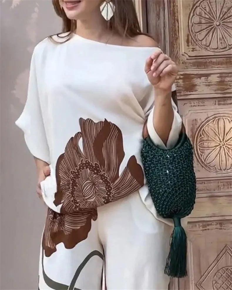White printed top and straight-leg pants casual fashion set on model