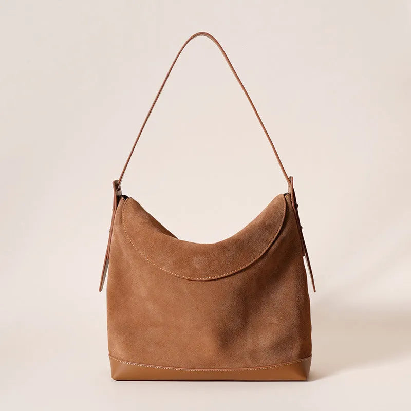 Genuine leather women's shoulder bag in brown with clamshell design and European retro styling