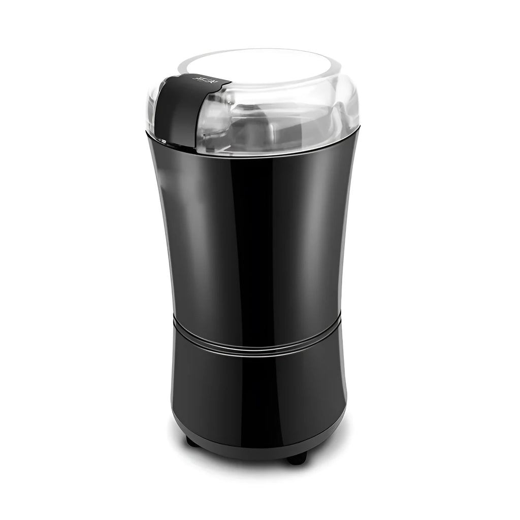 Black or purple mini electric grinder with stainless steel liner on a kitchen worktop