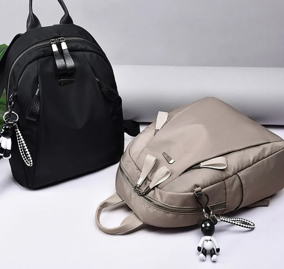 Medium square Oxford cloth rucksack in wine red with double straps and soft handle
