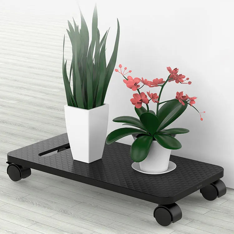 Orico black metal desktop computer CPU floor stand with wheels and three-sided baffle on a tiled floor