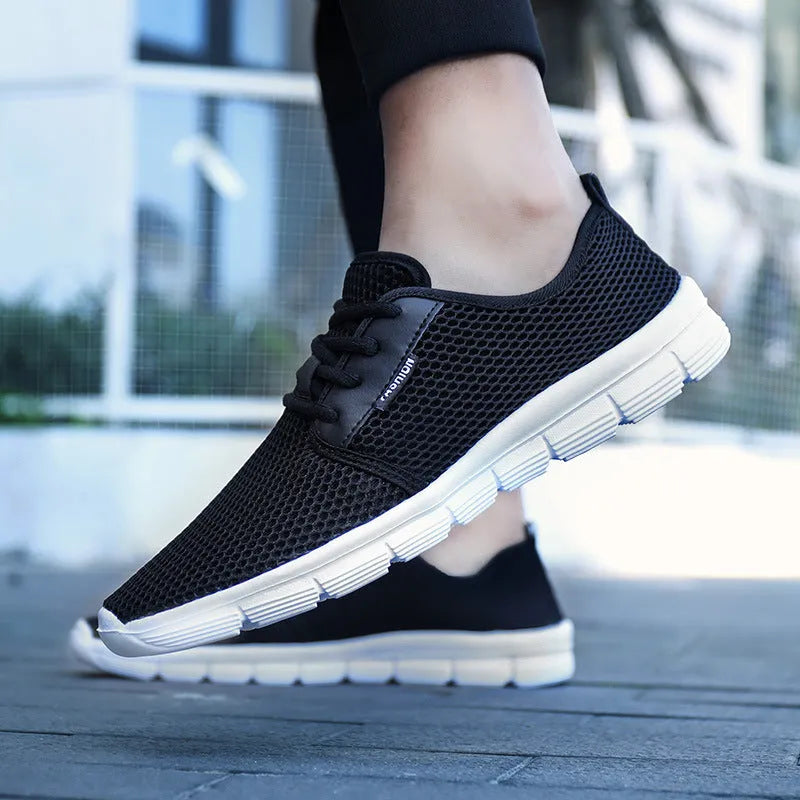 Men's casual running shoes with mesh upper and MD sole in black colour option for summer sportswear